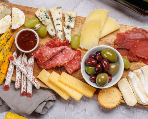 A styled charcuterie or snack board on a dining table