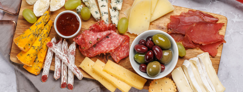 A styled charcuterie or snack board on a dining table